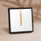 roman date keychain