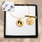 Footprint coin bracelet